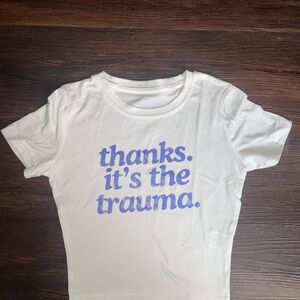 White T-Shirt with thanks. It’s the trauma